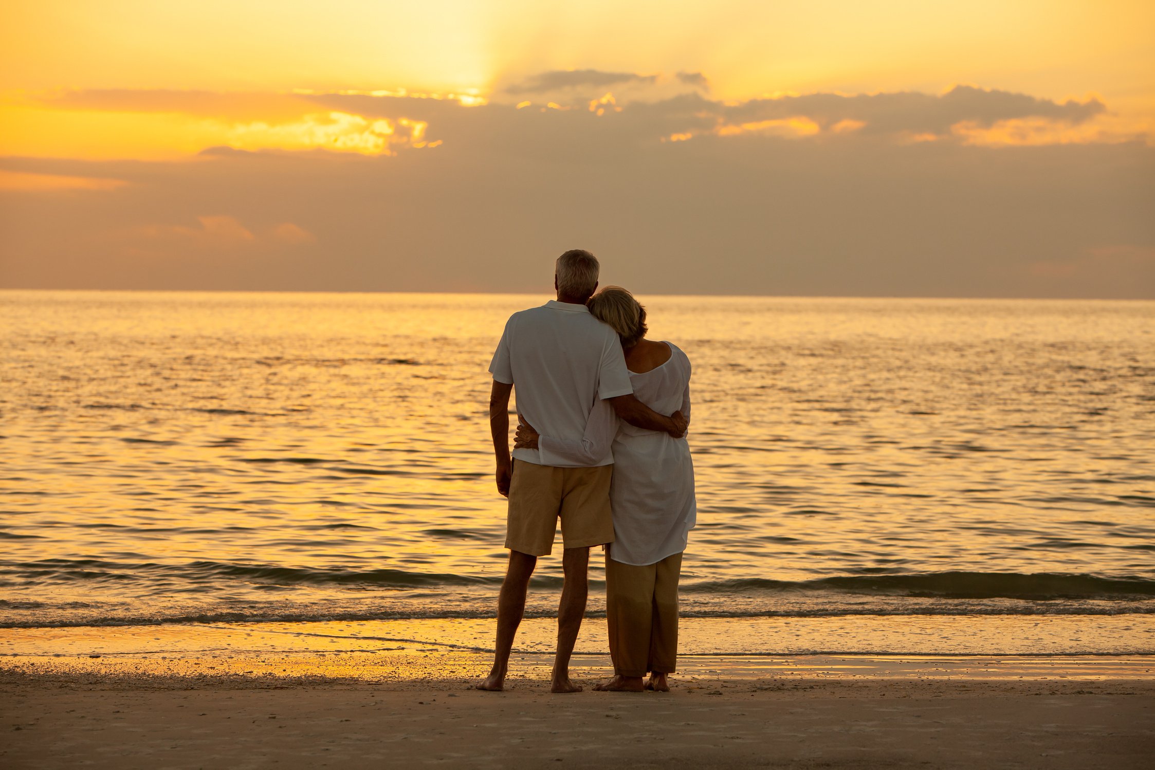 Senior Couple Sunset Tropical Beach